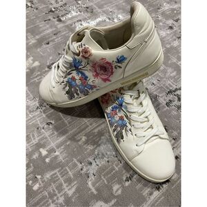 Size 43/44-10 1/2 Louis Vuitton ultra soft leather sneakers with floral detail.